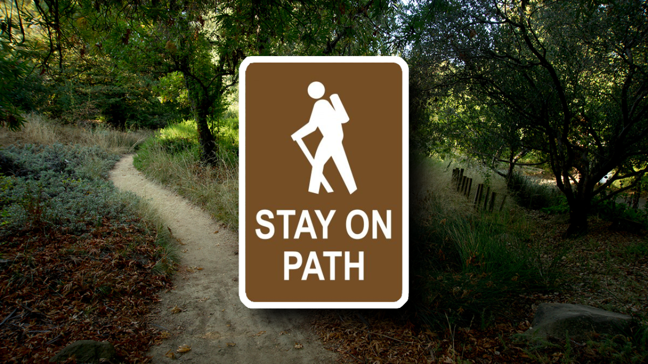 Arboretum path with "Keep on Path" sign